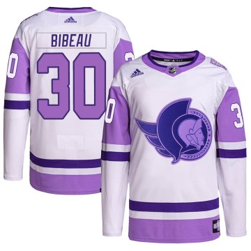 Authentic Adidas Men's Antoine Bibeau Ottawa Senators Hockey Fights Cancer Primegreen Jersey - White/Purple